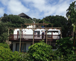 Stripping of original thatched roof structure